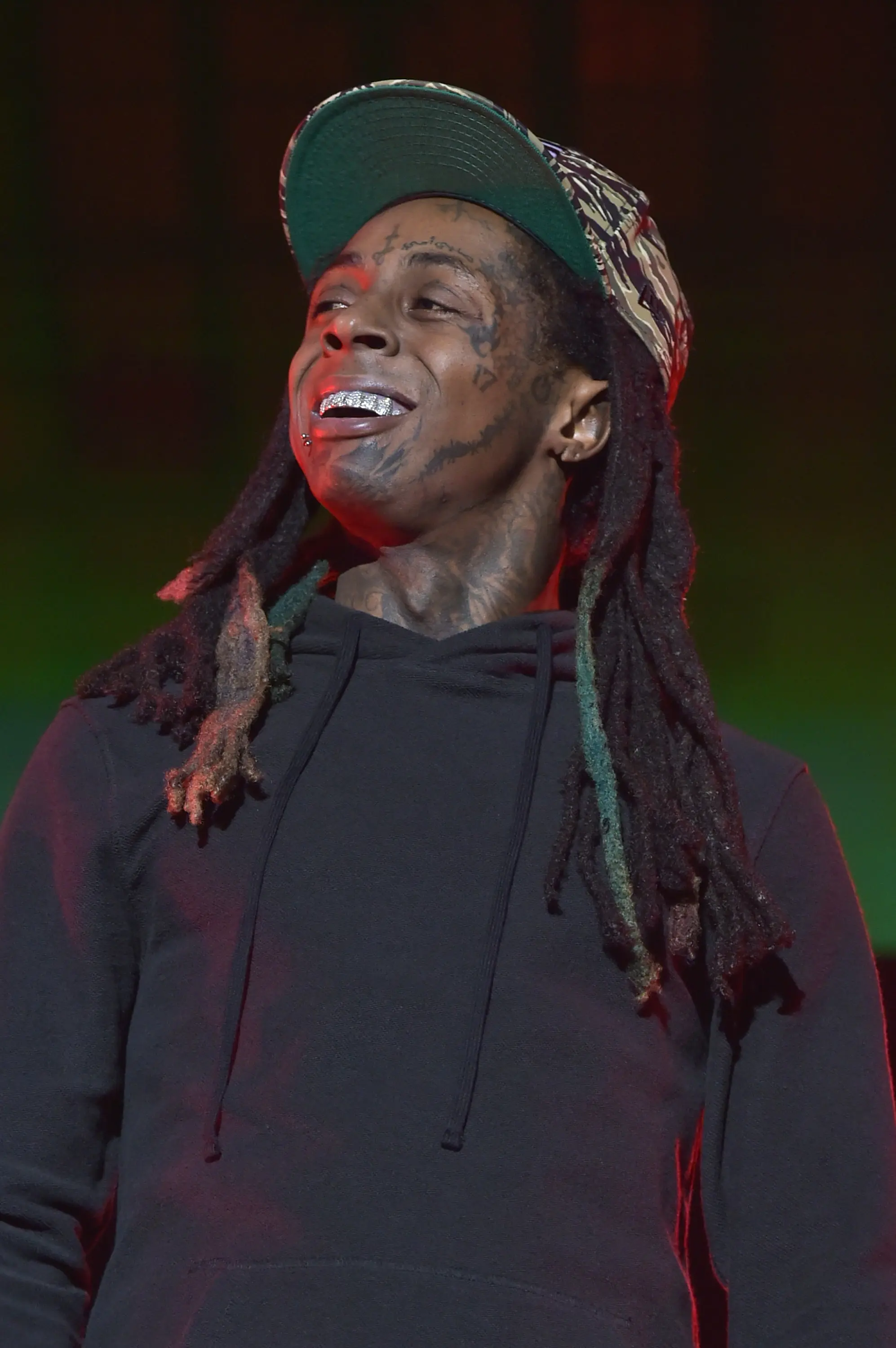 Lil Wayne, rapper ini benar-benar mendapat julukan ‘Lil Wayne’ ketika ia menjadi seorang ayah dari anak pertamanya, Reginae, pada usia 15 tahun. Hingga kini Lil Wayne telah menjadi ayah dari empat orang anak. (AFP/Bintang.com)
