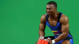 Atlet angkat besi asal Kolombia, Oscar Figueroa berencana menjadikan Olimpiade Rio 2016 menjadi ajang terakhir keikutsertaannya menjadi atlet. Usianya yang sudah mencapai 33 tahun menjadi salah satu alasan. (REUTERS/Yves Herman)