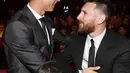 Sebagai rival, keduanya selalu mencoba fair saat di luar lapangan. Ronaldo mengakui bahwa rivalitasnya dan Messi sangat memotivasinya untuk terus berikan yang terbaik. Kini keduanya sedang berupaya mendapatkan gelar Piala Dunia 2022. (AFP/Ben Stansall)