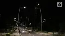 Suasana area pejalan kaki dan jalan di kawasan Kemang, Jakarta, Selasa (7/4/2020). Pemprov DKI Jakarta bakal menetapkan status Pembatasan Sosial Berskala Besar (PSBB) per Jumat, 10 April 2020 mendatang. (Liputan6.com/Helmi Fithriansyah)