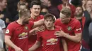 Daniel James (tengah) menjadi pemain pertama yang terkena dampak kepulangan sang bintang, Cristiano Ronaldo. Lini serang Setan Merah yang semakin padat, membuatnya dikabarkan akan dipinjamkan ke Leeds United untuk menambah jam bermainnya. (Foto: AFP/Oli Scarff)