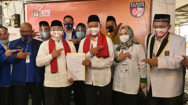 Pasangan Mohammad Idris-Imam Budi Hartono saat mendaftar di KPU Kota Depok saat Pilkada Kota Depok 2020. (Liputan6.com/Dicky Agung Prihanto)