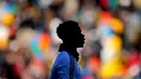 Pemain Juventus, Paul Pogba melakukan pemanasan sebelum laga Idinese vs Juventus pada lanjutan liga Italia Seria A di Stadion 'Dacia Stadium', Udine, Minggu (17/1/2016).  (AFP Photo/Marco Bertorello)