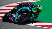 Pembalap Petronas Yamaha, Franco Morbidelli, saat mengikuti sesi latihan bebas MotoGP Catalunya di Circuit de Barcelona-Catalunya, Jumat (25/9/2020). Pembalab Yamaha, Morbidelli, finish pertama dengan catatan waktu satu menit 39,789 detik. (AFP/Lluis Gene)