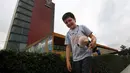 Carlos Santamaria Diaz (12) berpose untuk fotografer pada acara pers di Universitas Otonomi Nasional Meksiko di Mexico City, 3 Agustus 2018. Carlos menjadi satu-satunya mahasiswa termuda yang diterima di salah satu universitas terkemuka. (AP/Marco Ugarte)