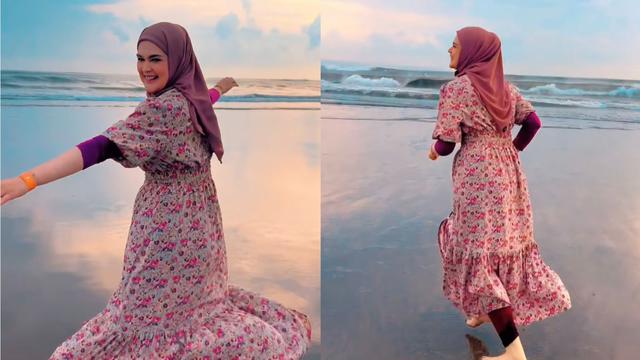 Cut Meyriska, istri Roger Danuarta memakai busana flowering