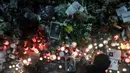 Mendiang pemimpin oposisi Rusia Alexei Navalny dimakamkan pada 1 Maret 2024 di pemakaman Moskow yang dihadiri ribuan pelayat, dua minggu setelah ia meninggal di penjara Kutub Utara. (OLIVER BUNIC/AFP)