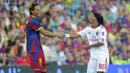 Ronaldinho - Semua penikmat sepak bola dunia tentu mengenal Ronaldinho. Senyuman acap kali ia perlihatkan baik saat dilanggar maupun melanggar pemain lawan. (AFP/Josep Lago)