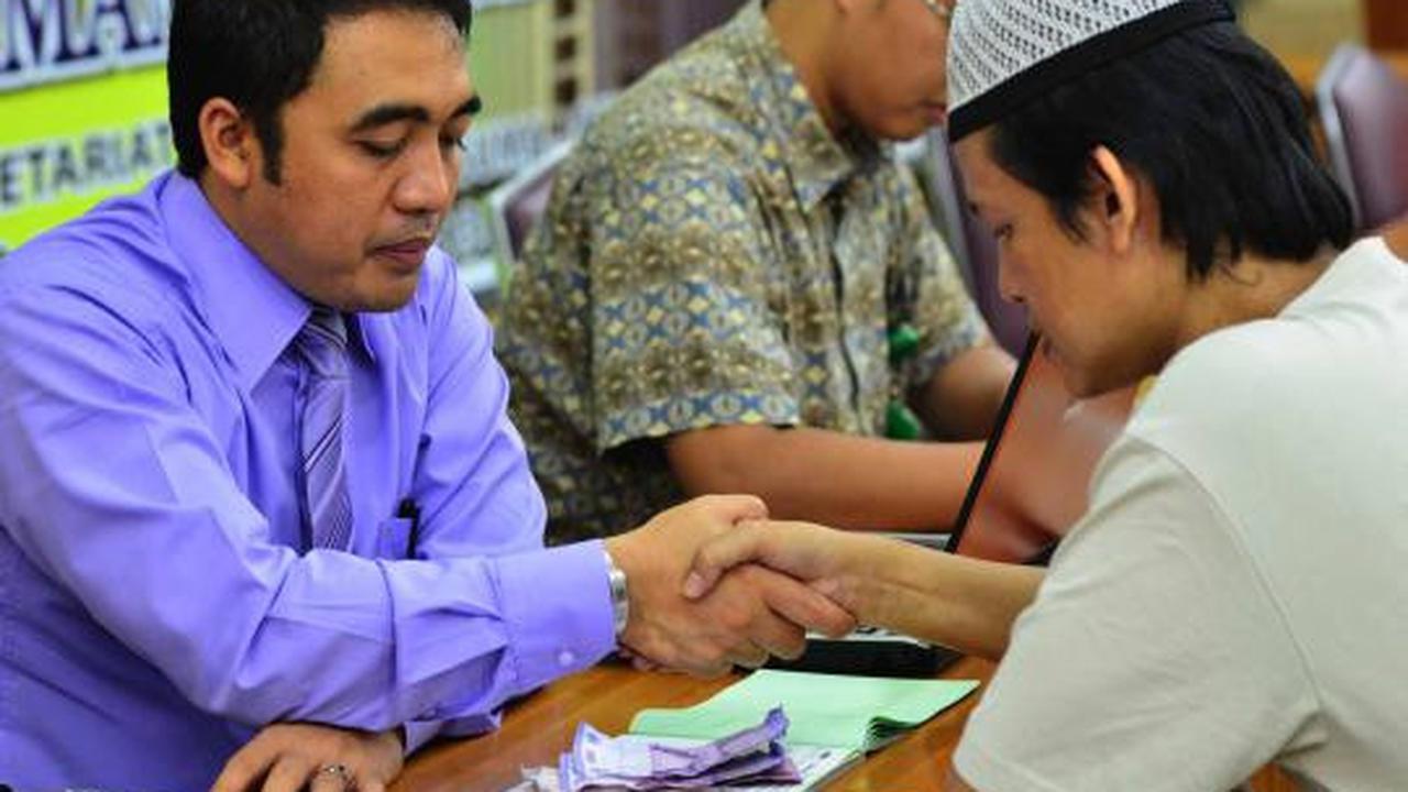 Bayar zakat fitrah di Masjid Istiqlal