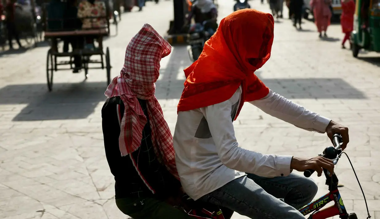 <p>Di Varanasi pada tanggal 29 Mei 2024, suhu mencapai 52,3 derajat Celcius (126,1 Fahrenheit). (Niharika KULKARNI/AFP)</p>