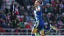 Jamie Vardy menjadi satu-satunya pencetak gol kemenangan untuk timnya saat melawan Suderland pada lanjutan liga Inggris di Stadium of Light, Minggu (10/4/2016). (Reuters/Russell Cheyne)