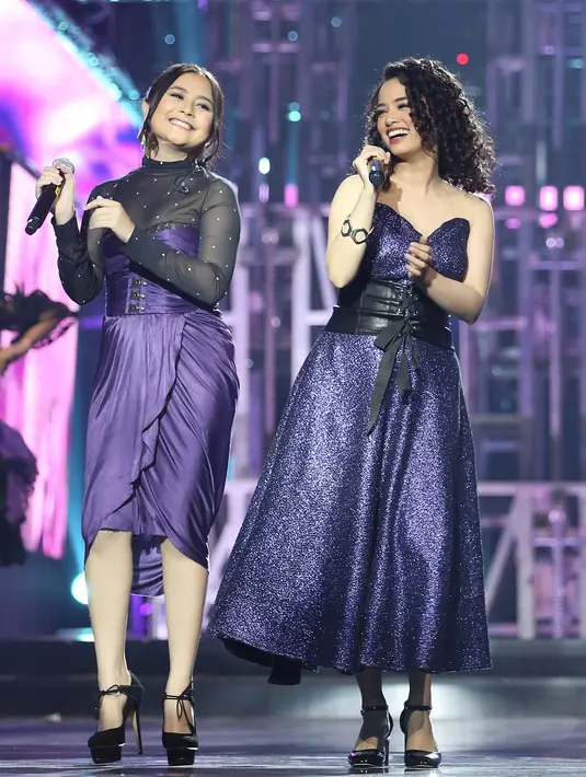 Tidak banyak latihan yang dilakukan sebelum tampil bareng untuk acara Amazing Global TV 15. Prilly Latuconsina dan Wizzy juga jarang ketemu. (Bambang E. Ros/Bintang.com)