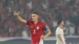 Ekspresi kapten Timnas Indonesia, Jay Noah Idzes, saat laga melawan China dalam laga Kualifikasi Piala Dunia 2026 zona Asia di Stadion Utama Gelora Bung Karno (SUGBK) Senayan, Jakarta, Kamis (5/6/2025). (Bola.com/M. Iqbal Ichsan)