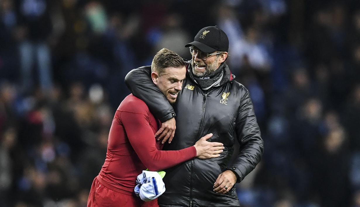Di bawah asuhan Jurgen Klopp, Jordan Henderson telah memainkan 233 laga sejauh ini. Umpan luas dari lini tengah dan kontribusi defensifnya telah sangat membantu permainan Liverpool. Klopp juga mempercayakan ban kapten The Reds terhadap pemain berkebangsaan Inggris itu. (AFP/Patricia De Melo Moreira)