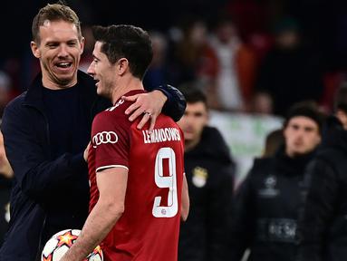 Julian Nagelsmann yang baru membesut Bayern Munchen di awal musim 2021/2022 ini sukses membawa pasukannya lolos ke babak perempatfinal Liga Champions 2021/2022 usai menang besar 7-1 atas RB Salzburg (8/3/2022). Berikut 5 kemenangan terbesar di musim 2021/2022. (AFP/Tobias Schwarz)