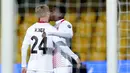 Pemain AC Milan Rafael Leao merayakan bersama Simon Kjaer setelah mencetak gol ke gawang Benevento pada pertandingan Liga Italia di Stadion Vigorito, Benevento, Italia, Minggu (3/1/2021). (Spada/LaPresse via AP)