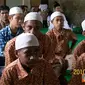 Citizen6, Jawa Tengah: Pendidikan layanan khusus (PLK) anak-anak korban konflik di Timika, Papua, di PLK Bima Sakti, Desa Cangkring, Kec. Karanganyar, Kab. Demak, setelah delapan bulan mengikuti pendidikan, siap kembali ke Papua. (Pengirim: Sadi)