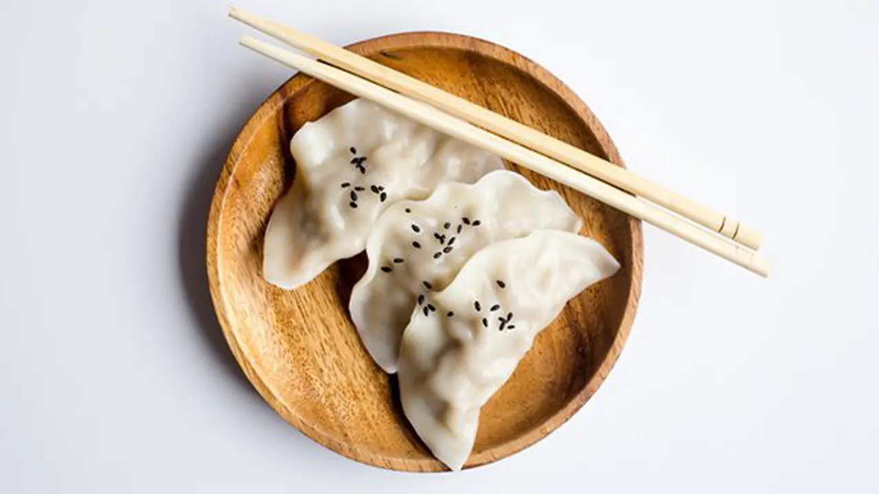 Ilustrasi dumpling isi daging ayam./Copyright unsplash.com/charles deluvio