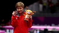 Rifda Irfanalutfhi pesenam Indonesia yang turun di nomor senam lantai berhasil meraih medali perak di Asian Games 2018 yang bertempat di JIExpo Kemayoran Hall D, Jakarta Jumat (24//8/2018). (Bola.com/Peksi Cahyo)