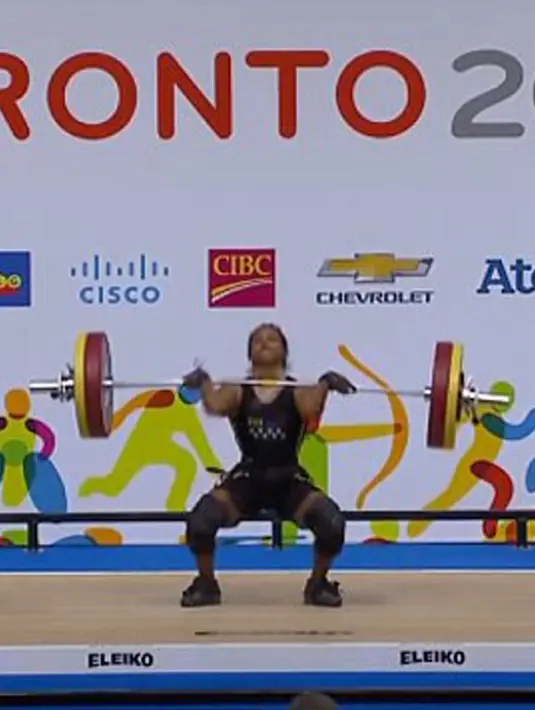 Atlet angkat besi putri Venezuela, Rodriguez Gomez berusaha mengangkat besi seberat 53 kg saat bertanding di Pan Am Games, Ontario, Kanada, 12 Juli 2015. (Dailymail)
