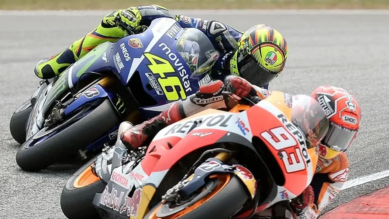 Valentino Rossi dan Marc Marquez (c) AFP