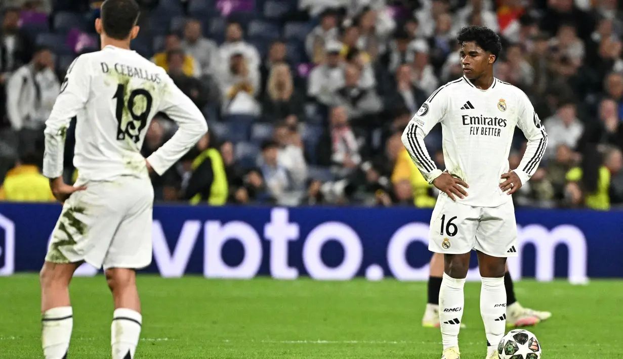 Kalah 1-2 pada leg kedua perempat final Liga Champions 2024/2025 memastikan Los Blancos tersingkir dari kompetisi Liga Champions 2024/2025. (JAVIER SORIANO/AFP)