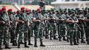 Prajurit TNI AD mengikuti Apel Gelar Pasukan Jajaran TNI AD di Lapangan Monas, Jakarta, Selasa (25/1/2022). Pasukan TNI AD dan Alutsista dipamerkan saat mengikuti gelar apel pasukan. (Liputan6.com/Faizal Fanani)