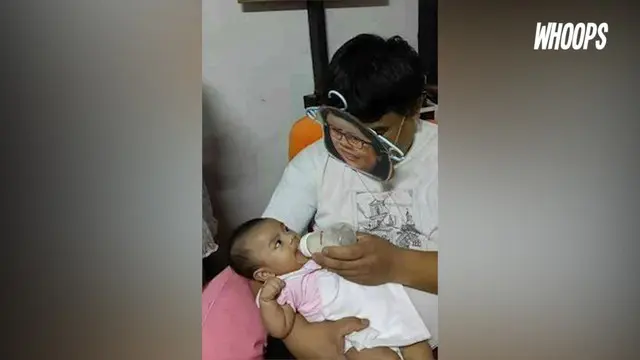 WHOOPS: Trik Lucu Seorang Ayah Ketika Menyusui Anak