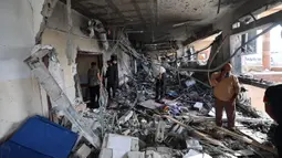 Militer Israel menyerang sebuah rumah sakit di Gaza Selatan, Palestina, pada Selasa (13/5/2025) dini hari waktu setempat. (Eyad BABA/AFP)