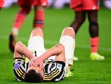 Reaksi penyerang Juventus, Arkadiusz Milik saat pertandingan sepak bola Serie A Italia melawan Udinese pada 12 Februari 2024 di Stadion Allianz, Turin. (MARCO BERTORELLO/AFP)