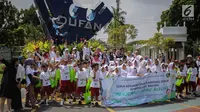 Anak-anak terdampak bencana tsunami dari Kampung Sumur, Pandeglang, Banten mengikuti rekreasi di Ancol Taman Impian, Jakarta, Selasa (26/2). Kegiatan ini diharap bisa membantu anak-anak dalam memulihkan kondisi psikologisnya. (Liputan6.com/Faizal Fanani)
