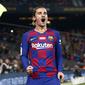 Selebrasi striker Barcelona Antoine Griezmann setelah mencetak gol melawan Real Mallorca di Camp Nou, Sabtu (7/12/2019) atau Minggu dini hari WIB. (AP Photo/Joan Monfort)