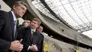 President of Ukraine Viktor Yushchenko (L) and President of FC Shakhtar, multi-millionaire Rinat Akhmetov (2L) visit the construction site of a stadium in the country's eastern industrial city of Donetsk on April 17, 2008. AFP PHOTO/MYKOLA LAZARENKO