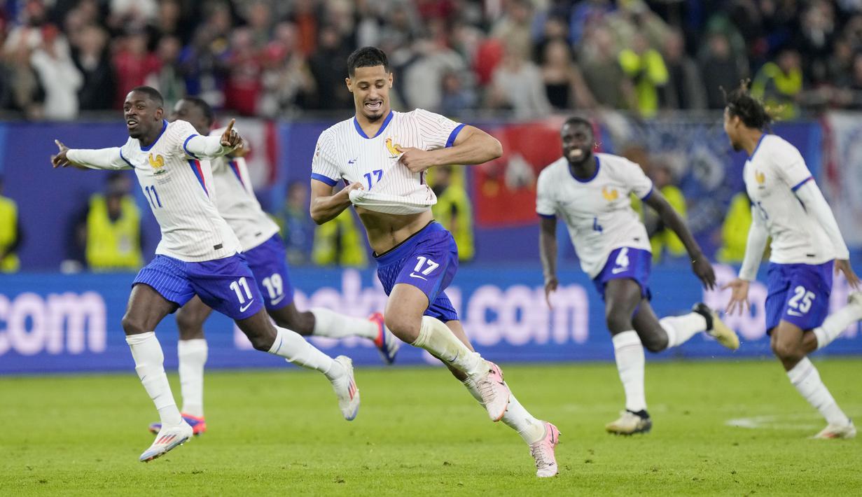 Les Blues menang 5-3 atas A Selecao das Quinas lewat babak tos-tosan, setelah skor imbang 0-0 bertahan hingga 120 menit. (AP Photo/Martin Meissner)