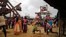 Bocah-bocah Rohingya bermain riang selama perayaan Idul Adha di kamp pengungsi Kutupalong, Bangladesh, Rabu (22/8). Bagi kebanyakan pengungsi, ini adalah Iduladha pertama sejak mereka diusir secara paksa dari Myanmar tahun lalu. (AP/Altaf Qadri)