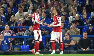 Pemain Arsenal Max Dowman (kanan) merayakan gol dalam laga babak ketiga Carabao Cup antara Ipswich vs Arsenal di Ipswich, Inggris, Selasa, 15 September 2026. (Joe Giddens/PA via AP)