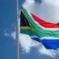 Ilustrasi bendera negara Afrika Selatan. (Photo by Den Harrson on Unsplash)
