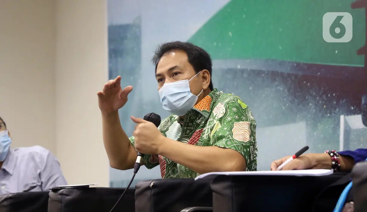 Wakil Ketua DPR bidang Korpolkam Azis Syamsuddin saat menjadi pembicara dalam diskusi forum legislasi di Jakarta, Selasa (13/4/2021). Diskusi membahas RUU Kejaksaan, Komitmen DPR Perkuat Kinerja Korps Adhyaksa. (Liputan6.com/Angga Yuniar)