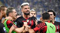 Pemain AC Milan Olivier Giroud (tengah) melakukan selebrasi usai mencetak gol ke gawang Sampdoria pada pertandingan sepak bola Serie A Liga Italia di Genova, Italia, 10 September 2022. AC Milan menang dengan skor 2-1 atas Sampdoria. (Tano Pecoraro/LaPresse via AP)