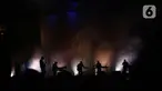 Grup band indie, Efek Rumah Kaca (ERK) saat tampil di Joyland Festival Jakarta 2024 di Baseball Stadium Senayan, Sabtu (23/11/2024). (Liputan6.com/Angga Yuniar)