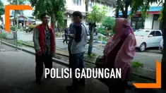 Dituduh membawa narkoba, seorang ojek online malah dirampok oleh pelaku yang berpura-pura jadi polisi.
