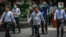 Sejumlah karyawan menggunakan masker saat beraktifitas di luar kantor di Jakarta, Senin (2/3/2020). Usai diumukan Presiden Jokowi bahwa ada 2 WNI yang terkena virus corona, banyak para pekerja menggunakan masker saat beraktifitas. (Liputan6.com/Faizal Fanani)