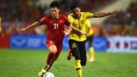 Timnas Vietnam menang 2-0 atas Malaysia pada laga ketiga Grup A Piala AFF 2018, di My Dinh Stadium, Jumat (16/11/2018) malam WIB. (AFP/Manan Vatsyayan)