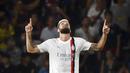 Pemain AC Milan, Olivier Giroud, melakukan selebrasi setelah mencetak gol ke gawang Bologna pada pekan pertama Serie A di Stadion Renato Dall'Ara, Selasa (22/8/2023). AC Milan menang dua gol tanpa balas. (Massimo Paolone/LaPresse via AP)