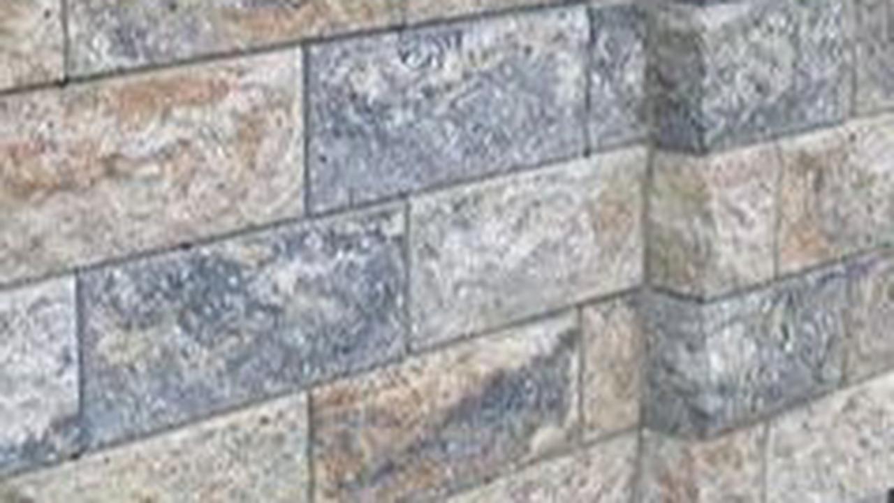 Desain Pagar Tembok Minimalis Material Batu Alam