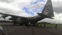 Pesawat Hercules Singapura bantu pencarian AirAsia (Liputan6.com/Ahmad Romadoni)