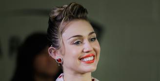 Miley Cyrus melakukan istirahat dari sosial media. Ia pun menghapus seluruh foto yang pernah diunggahnya. (Isaac Brekken  GETTY IMAGES NORTH AMERICA  AFP)