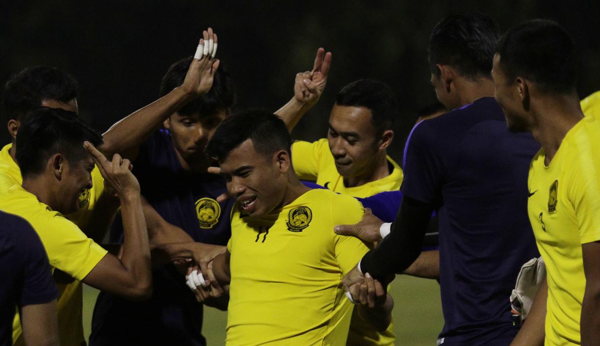 Pemain Timnas Malaysia, Safawi Rasid, saat latihan jelang laga kualifikasi Piala Dunia di Lapangan ABC, Senayan, Jakarta, Selasa (3/9). Malaysia akan berhadapan dengan Indonesia. (Bola.com/M Iqbal Ichsan)