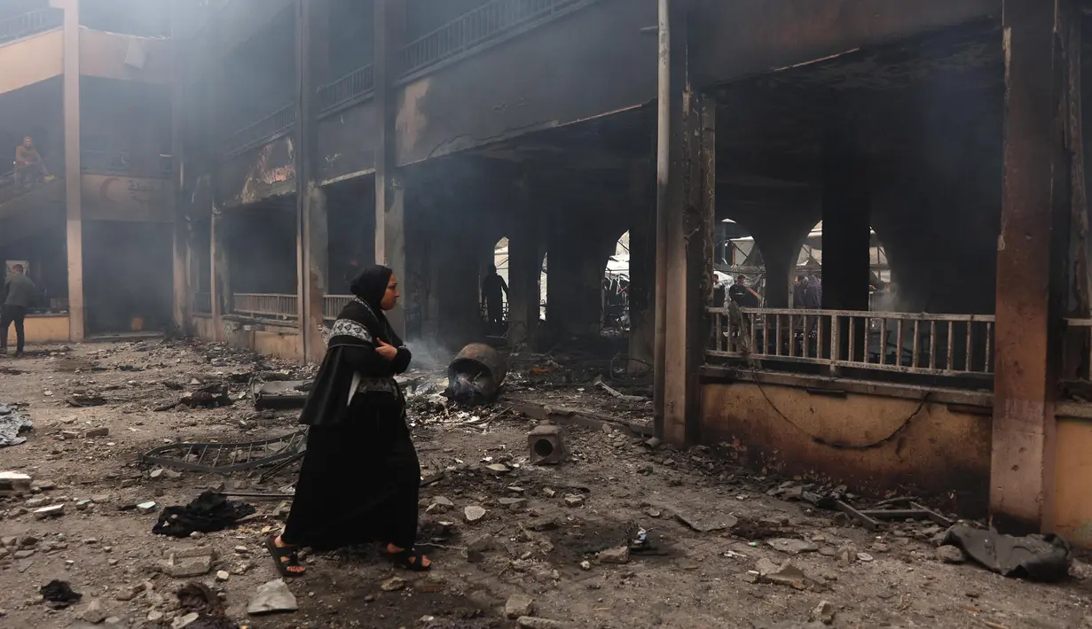 Diketahui, gedung sekolah ini telah diubah menjadi tempat penampungan pengungsi Palestina. (Omar AL-QATTAA/AFP)