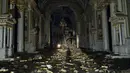 Rudal-rudal Rusia merusak sebuah katedral Ortodoks bersejarah di kota pelabuhan Odesa, Ukraina selatan, yang memicu kemarahan dan mendorong Presiden Zelensky bersumpah akan melakukan pembalasan.  (AP Photo/Libkos)